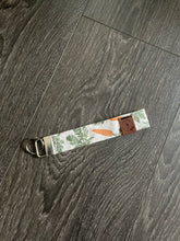 Load image into Gallery viewer, Carrot Patch Wristlet Keychain

